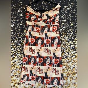 Off the shoulders, comic strip dress